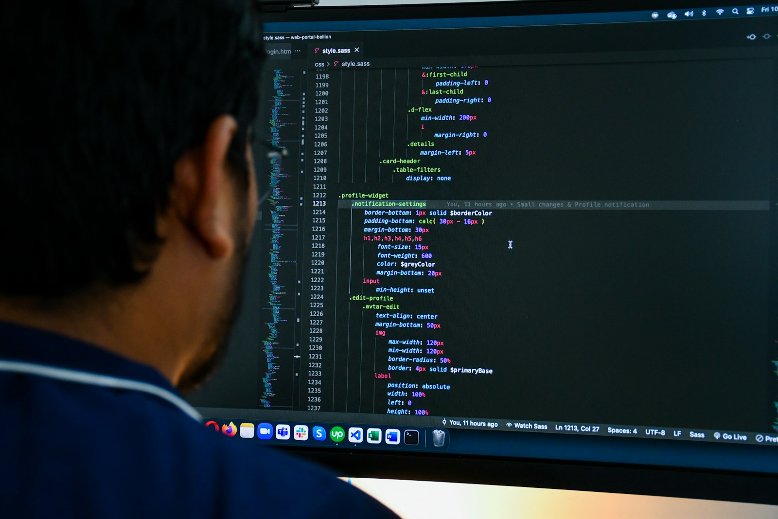 a man looking at a computer screen